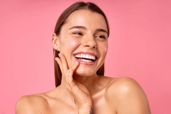 Confident person with healthy teeth and radiant facial appearance